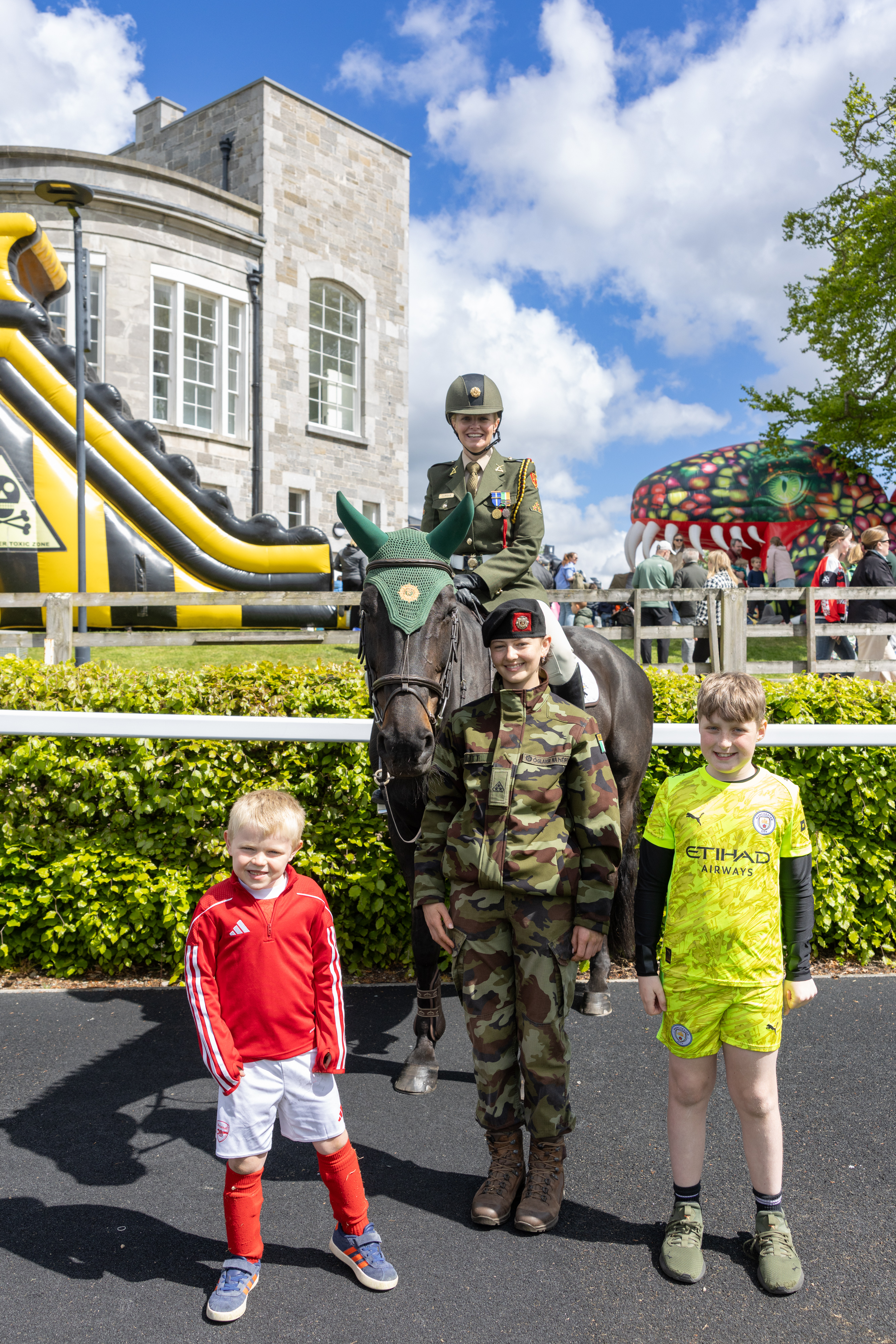 Children with horse and members of the Army. 